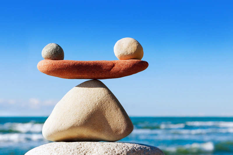 Concept of harmony and balance. Balance stones against the sea.